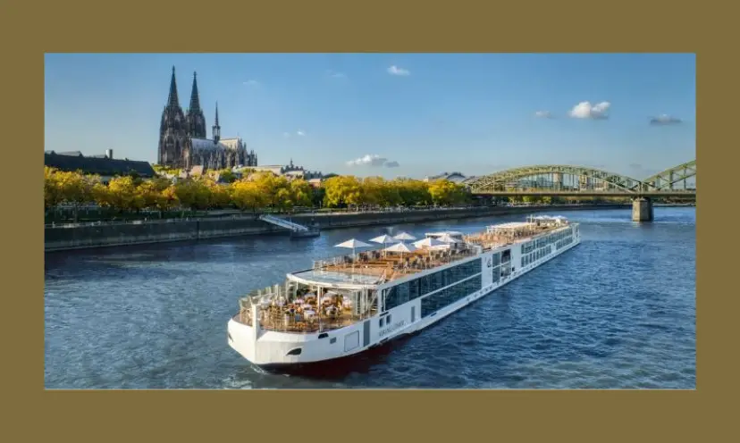 This photo features a Viking cruise ship on a pristine river with European architecture in the background.