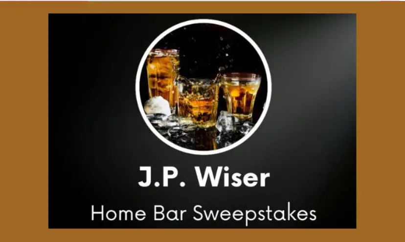 This photo features wording that says "J.P. Wiser home bar sweepstakes" along with several glistening glasses filled with a golden crafted drink.