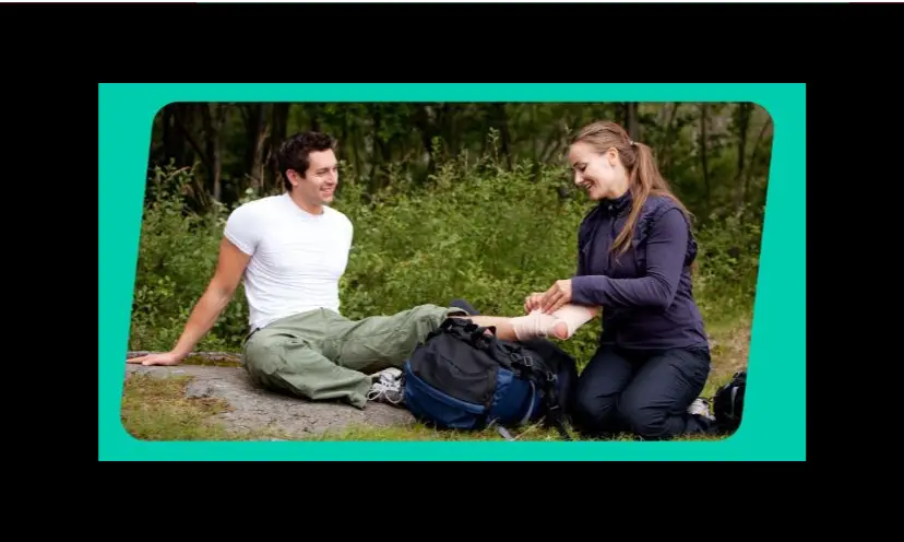 This is a photo of a couple in the woods, maybe on a hike. The guy appears to be injured and the lady is tending to his issue using the Jase Case in this giveaway.