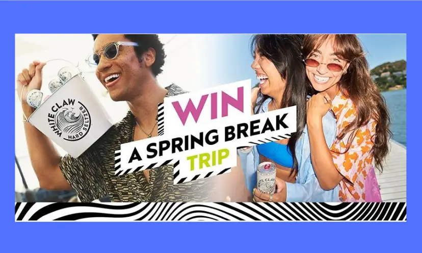 This photo features one guy and two young ladies on a spring break adventure. The caption says "win a spring break trip". The man is holding a White Claw Seltzer Bucket and you can see the beautiful blue ocean in the distance!