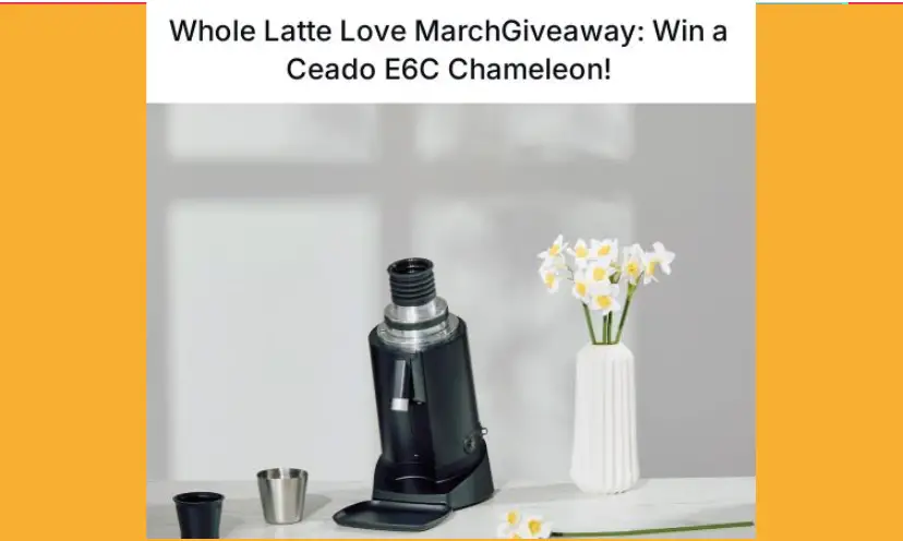 This photo shows off the amazing coffee grinder being offered in the sweepstakes. To the side of this beauty of a machine is a bouquet of daffodil flowers, creating a fresh, homey look. The caption above says "Whole Latte Love March Giveaway and "Win a Ceado E6C Chameleon"...which is the fantastic coffee bean grinder in the giveaway!