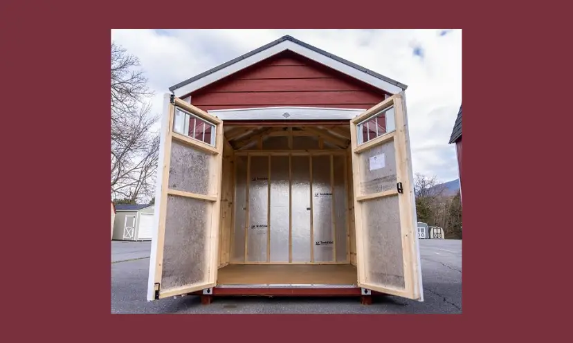 This is a photo of the extremely attractive shed in this giveaway. It shows the interior and part of the exterior which completes the appeal of it's looks and large storage area!