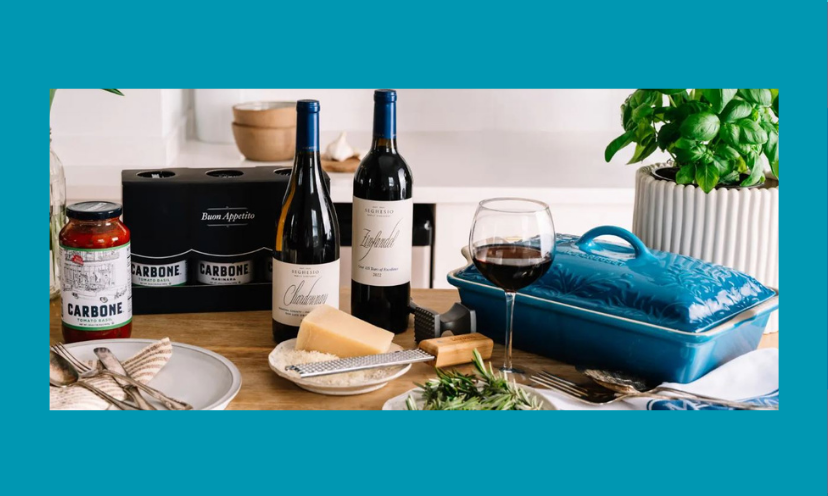 This photo features everything about this giveaway...from the beautiful blue Le Creuset casserole dish to the Seghesio wine bottles...all set up on an inviting table that's prepped for a feast!