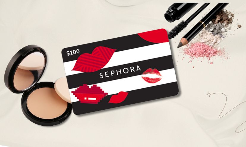 Image of a Sephora gift card overlaying beauty items like a powder compact, eyeliner, and a mascara wand