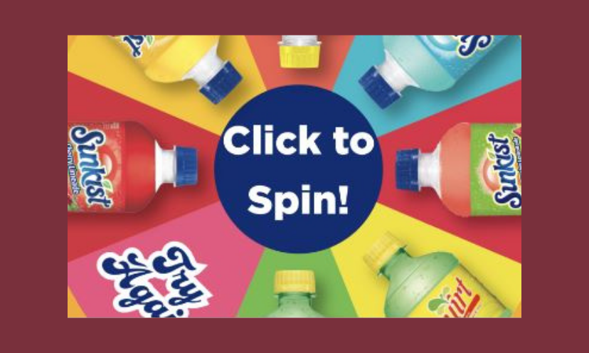 This photo shows us the "spin to win" game which is the goal of this giveaway. It has the "button" to click and is surrounded by refreshing bottles of sponsored beverages!