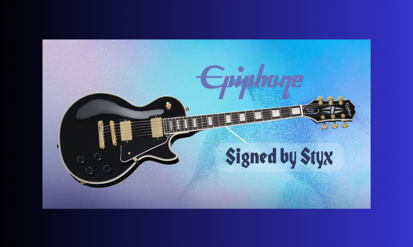 This is a full photo of the shiny, mostly black and silver, guitar in this giveaway. The caption says "Epiphone...signed by Styx"!
