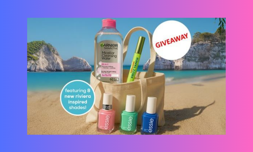 This photo is all about the essie and Garnier sweepstakes, complete with a beach bag overflowing with products from both. The bag is on...you guessed it...a beach with a breathtaking and colorful water and mountain scene as the backdrop!
