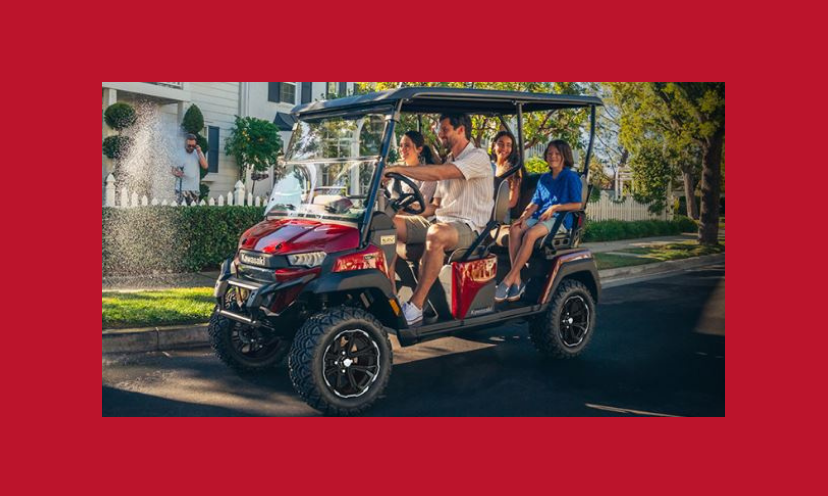 This photo is that of the prize in this giveaway...a Kawasaki NAV 4e. It's kind of a motorcycle, four wheeler and car all rolled into one. This one is predominantly red and filled with four passengers enjoying their ride!