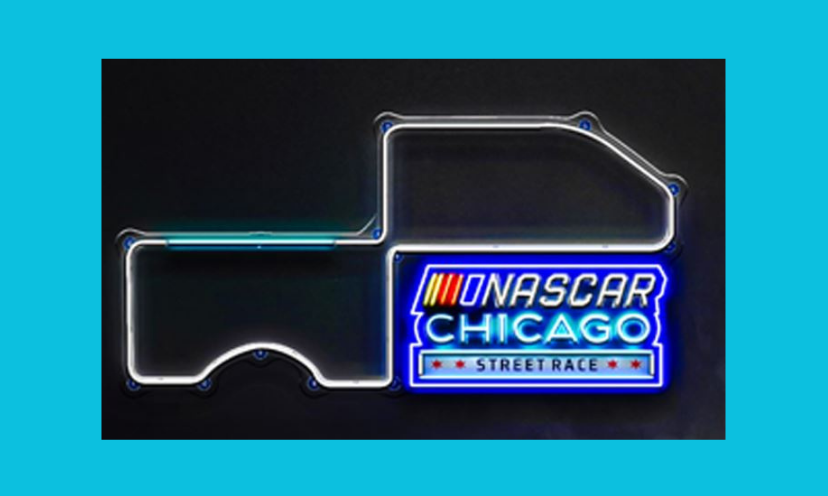 This photo is simply that of the neon Nascar light in this sweepstakes. The bright sign with a blue glow says "NASCAR CHICAGO street race" on it's side!
