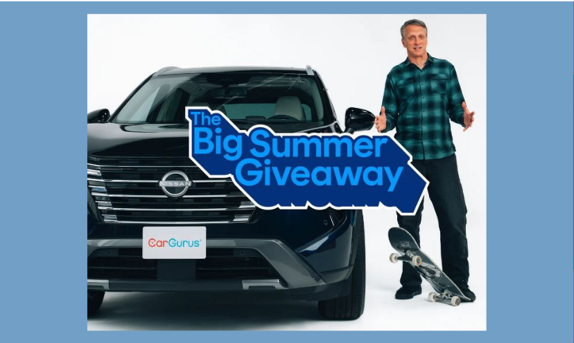 This is a photo of the amazing Nissan Rogue Rock Creek SUV you could win! A man with a skateboard is standing beside it as if he's trading his "ride" for a far better one. The caption says "The big Summer Giveaway"!