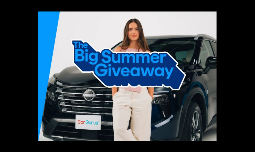 This is the official giveaway photo featuring a girl standing in front of a black SUV that carries a tag with the CarGurus logo. The large caption in front says "The Big Summer Giveaway"!
