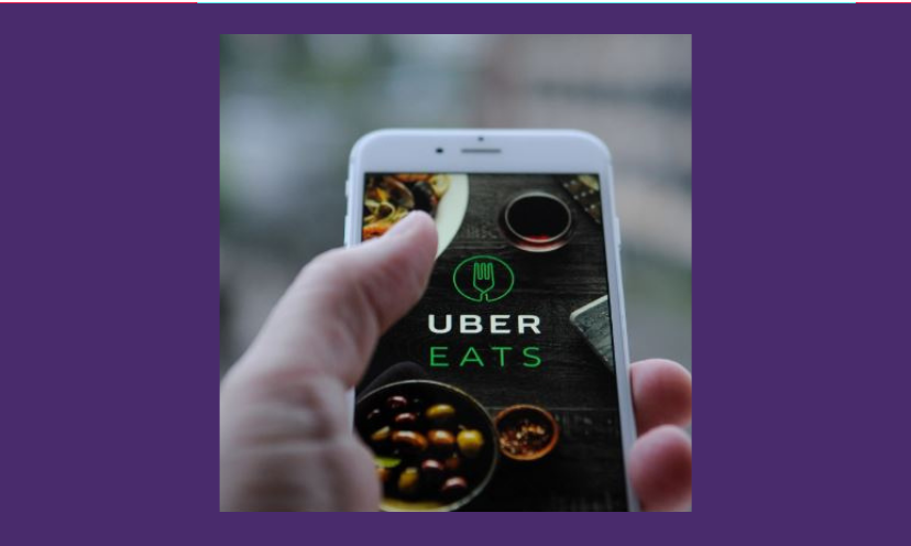 This is a photo of someone holding their smartphone with the Uber Eats app ready to place an order!