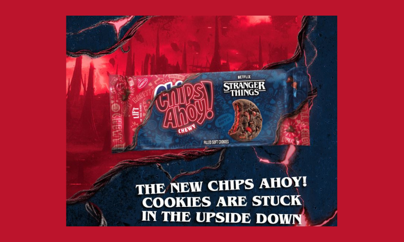 This photo features a package of the amazing Stranger Things Chips Ahoy cookies against a matching background. The caption says "The new Chips Ahoy! cookies are stuck in the upside down"!