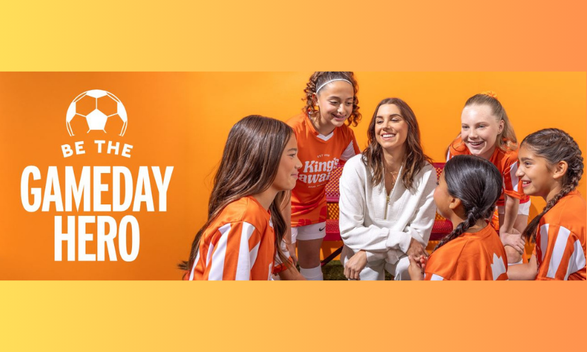 This photo features a girls soccer team filled with excitement. The caption says "be the game day hero"...and you will be if you enter and win this jackpot for your favorite team!