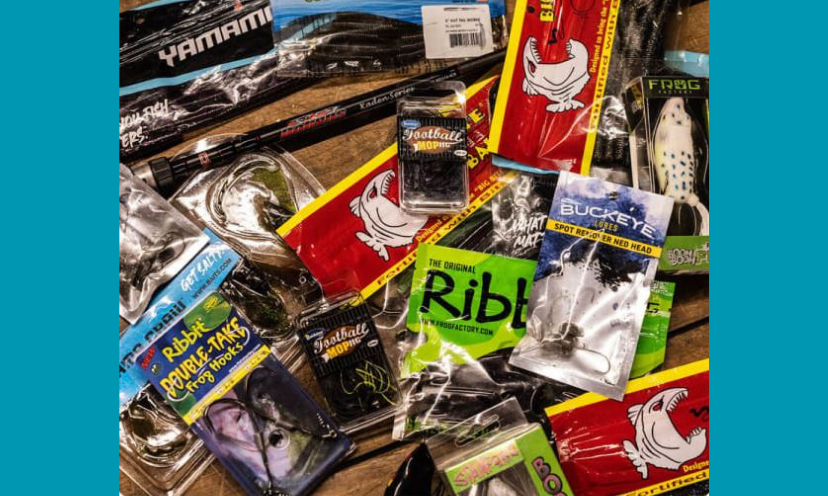 This photo provides a close up look at some of the fishing loot available in this giveaway. From hooks, lures, poles and so much more...this is a major gift for any fishing fanatic!