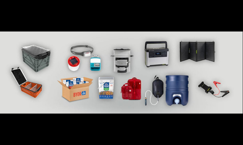 This photo shows each item in the emergency prep kit offered in this giveaway. From energy to water to food...this package has it all!