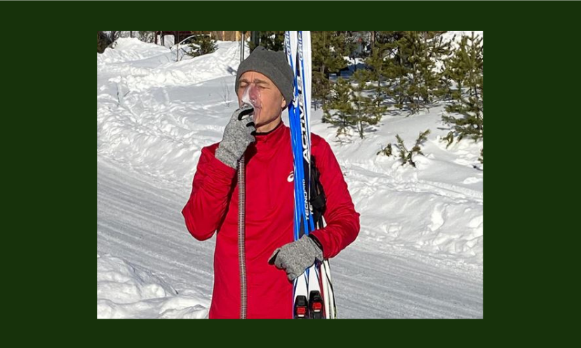 This is a photo of a skier on a snowy slope taking a break for a breath of fresh air by using his Cardihaler...like the one in this giveaway!
