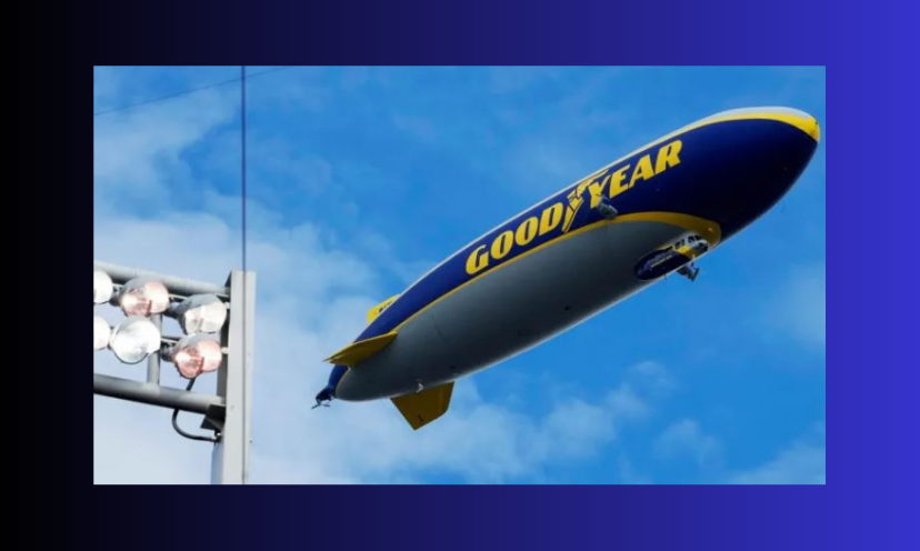 This ia a photo of the Goodyear blimp flying high over a major sporting event...and this winner will get to experience it!