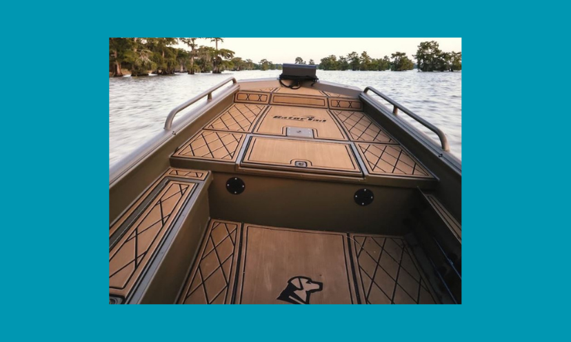 This photo provides a close up view of and from the inside of the boat you could win in this giveaway. The water is even waiting in the background!