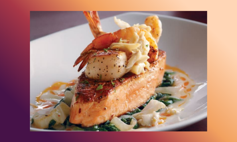 This is more than a photo...its a picture that makes taste buds ecstatic. It is a close up shot of flaky salmon topped with shrimp and scallops, sitting on a sauce that looks as good as the entree! That sums up what Pappadeaux can serve up!