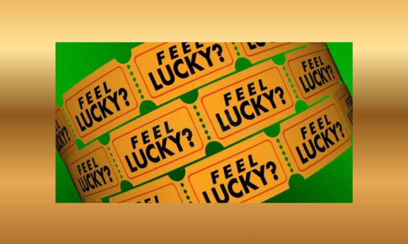 This is a photo of a roll of tickets like the ones for entering a carnival. Only these say "feel lucky?"...as if to urge you to enter a giveaway!