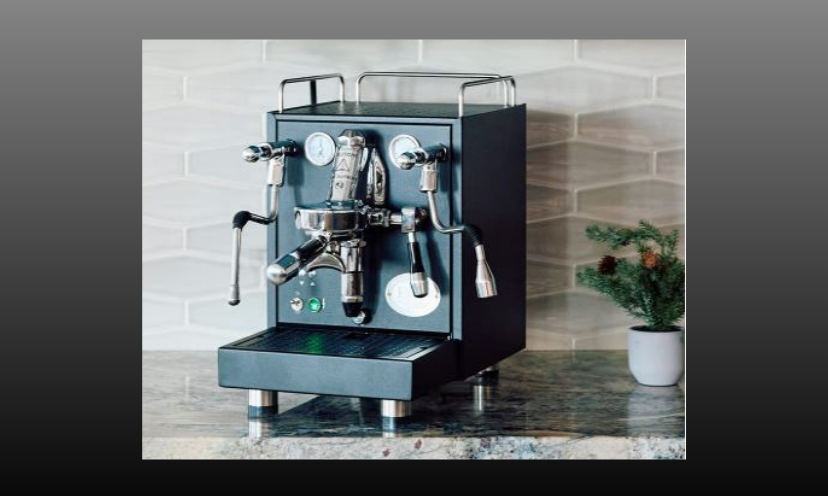 This is a photo of the ECM Mechanika Max Espresso Machine that you could win here. However, the one pictured is blue and the prize machine will be in black!