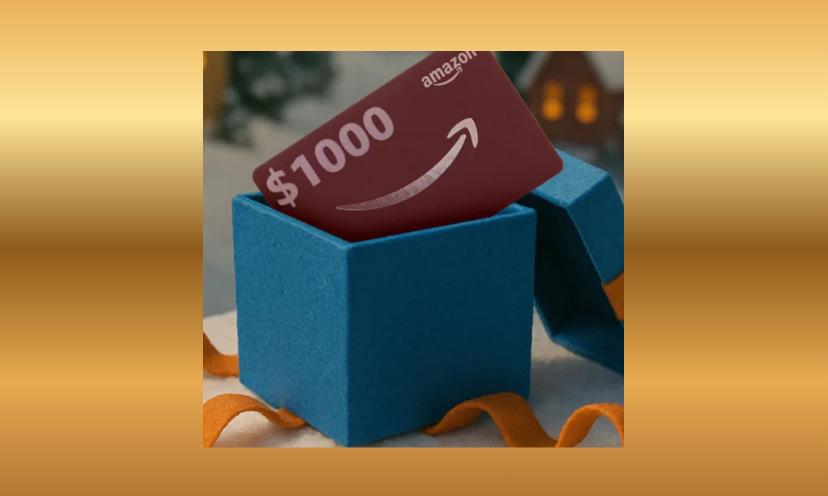 This is a photo of a blue gift box with golden ribbon and it's holding a $1,000 Amazon gift card!