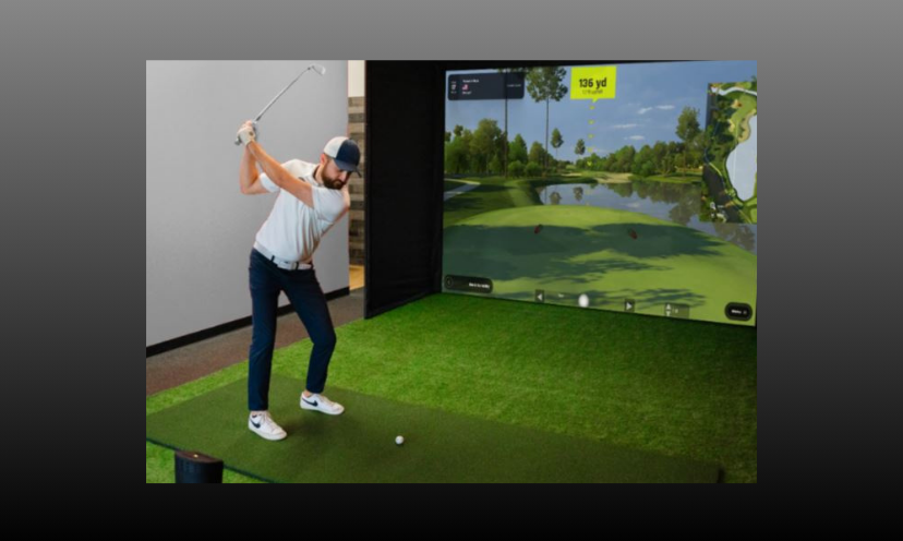This is a photo of a man about to take a swing and experience his new Golf In A Box set up...just like the one in this giveaway! It has pictured the "green" and the large screen that makes a golfer feel the fun of being on the course without leaving home!