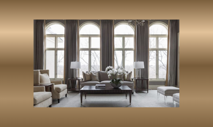 This photo represents this window makeover giveaway with an impressive display of gorgeous windows in what appears to be a cozy living room setting!