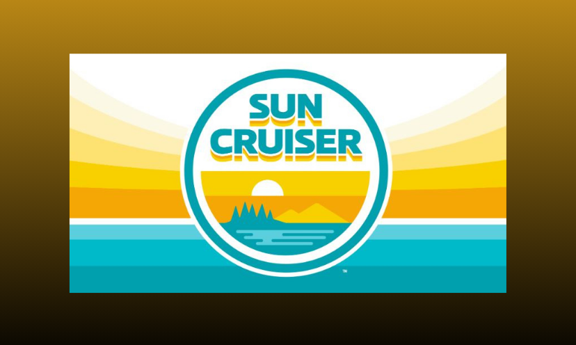 This photo is the bright logo of Sun Cruiser...which brings this win to you. It shows a simulated water view complete with mountains, trees and a glowing sunset!