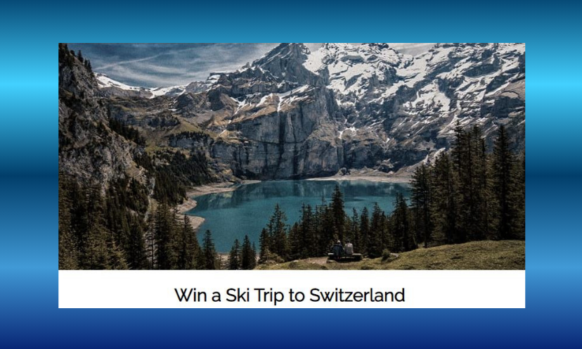 This photo captures the beauty of Switzerland. The snow capped mountains surrounding a vibrant blue lake is bordered with tall evergreen trees. A caption at the bottom says "win a ski trip to Switzerland"!