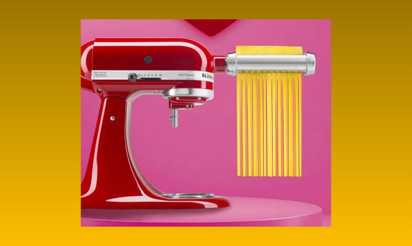 This is a photo of the red KitchenAid mixer with pasta attachment offered in this giveaway. It's the perfect Valentine win as this setup will become the heart of any kitchen!