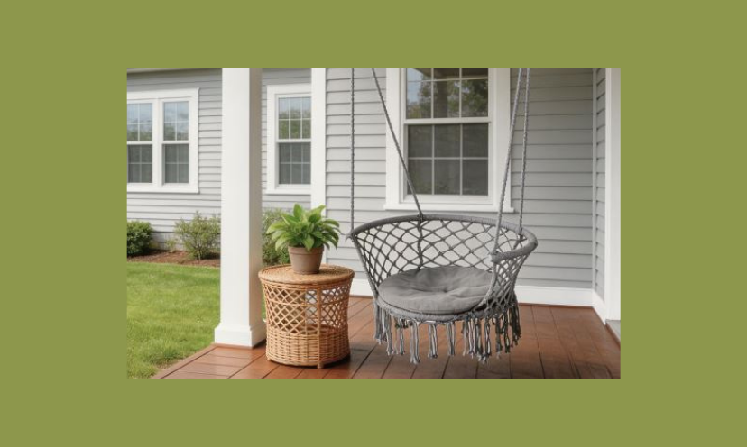 This photo presents a cozy and peaceful vibe with a comfortable hammock swing waiting on a covered outdoor porch!