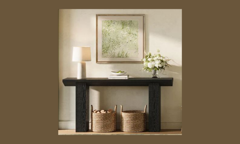 This photo features the beautiful Tribesigns console table that is offered in this giveaway! It is pictured here with lamps, flowers, baskets and other cizy accents.