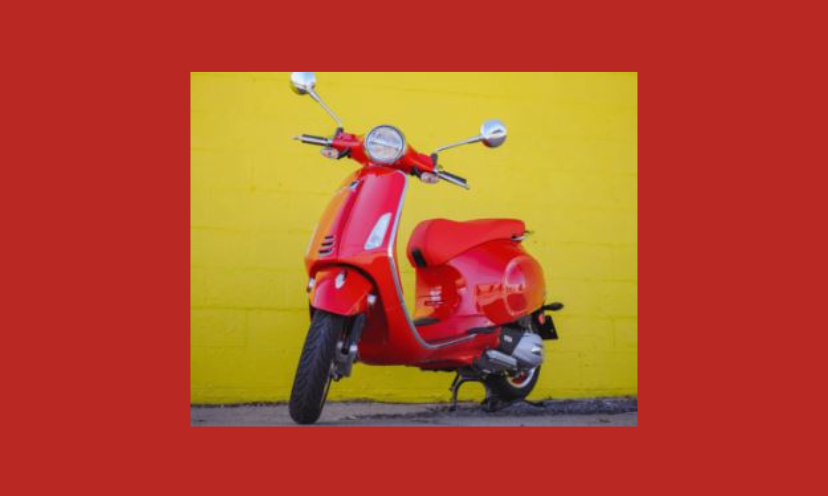 This is a photo of the $6,930 2025 Vespa Primavera 50 RED Scooter that you could win in this sweepstakes!
